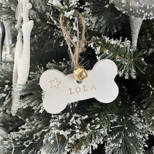 Personalised Gift for Dog Lovers, Tree Ornament, Custom Clay Decoration with Gold Lettering and Jingle Bell, Unique Dog Name Ornament.