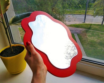 Red small wall mirror decor wavy shape
