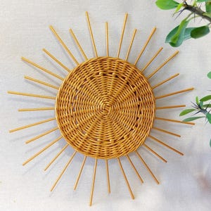 Wicker sun wall decor for boho nursery