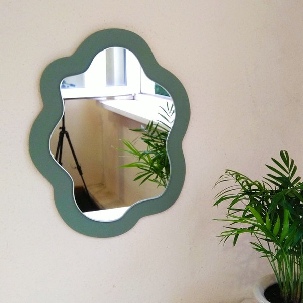 Sage green asymmetrical mirror wall decor