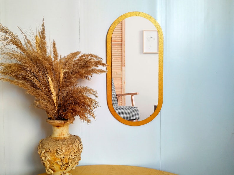 13.8 Small oval decorative mirror for wall Gold