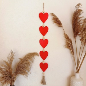 May include: A rustic wooden sign with the text "Welcome to our home" in white lettering. The sign has a distressed finish and a simple, inviting design, ideal for entryway decor.