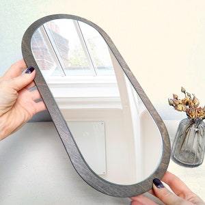 13.8 Small oval decorative mirror for wall Wenge