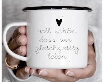 Enamel mug full of nice that we live at the same time