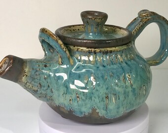 Ceramic teapot with lid from Beechwood Pottery, Youngsville, NC. By Marian