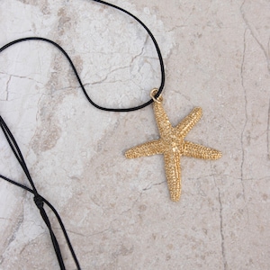 Collier Pendentif étoile De Mer En Métal Bronze - Cordon Noir, Neuf Avec étiquettes