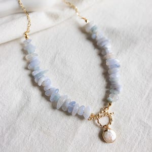 Elegant Blue Lace Agate Necklace w Gold Toggle Clasp and Pearl Charm - Handmade Statement Jewelry, Perfect for Gifts & Coastal Style