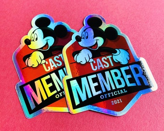 Disney Cast Member 2021 Emblem Holographic STICKER. This is a 1 Piece, 3" x 3.87" Die-cut, Weatherproof, Sticker.