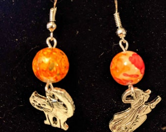 Halloween earrings.  A witch and a her familiar!