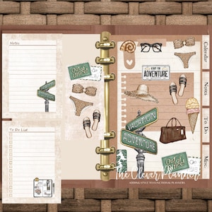 May include: A planner with a brown and beige cover and gold rings. The planner has a variety of stickers, including a pair of sunglasses, a seashell, a bikini, a straw hat, a suitcase, and a sign that says "Vacation Adventure".