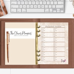 May include: A brown leather bound planner with gold rings and a beige page with the text "The Clever Planner" and "Password Tracker". The page has a light brown background with a distressed look and a pink heart with the word "Tip" on it.