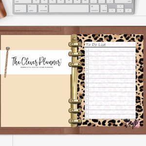 May include: A brown leather planner with gold rings and a white page with the text "The Clever Planner" and a leopard print page with the text "To Do List" and a checklist.