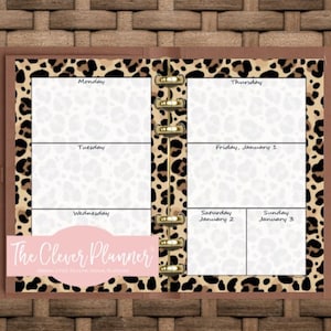 May include: A weekly planner insert with a leopard print border and gold disc binding. The white pages feature black text for Monday through Sunday, including January 1, 2, and 3. A pink label with the text The Clever Planner is overlaid on the bottom left.