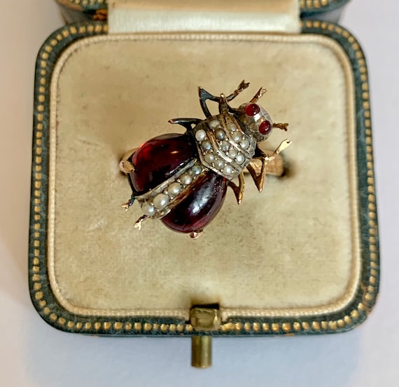An Impressive Garnet, Ruby & Pearl Bug Ring Circa… - image 1