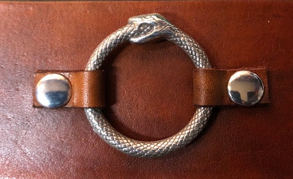 ouroboros belt buckle