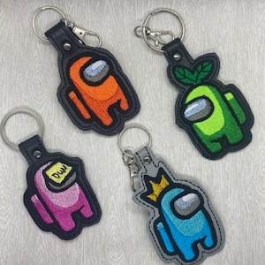 Among Us Embroidered vinyl Key chain or Bag Tag. This is just a sample of what can be made. Each one is Custom made. Very Detailed!