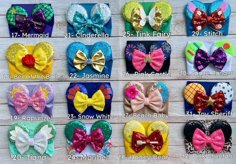 May include: A set of 12 colorful headbands with character-themed ears and bows. The headbands feature characters like Ariel, Cinderella, Tinkerbell, Stitch, Belle, Jasmine, Rapunzel, Snow White, Tiana, Maribel, Honey Bear, and Pink Cheetah.