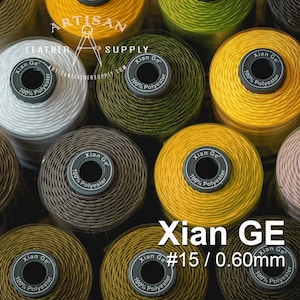 May include: Close-up of spools of Xian Ge #15 waxed polyester thread in various colors, including white, brown, green, yellow, and orange. The thread is 0.60mm thick.