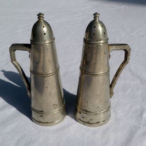 vintage peerless pewter salt and pepper shakers with screw top image 1