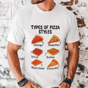 May include: White t-shirt featuring the text "TYPES OF PIZZA STYLES" with illustrations of different pizza slices. The pizza styles include Chicago, Neapolitan, Detroit, Sicilian, Rhode Island, and Classic NYC.