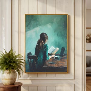May include: A framed painting depicts a person reading at a wooden desk. The person, seen from the back, wears a green top and sits in a wooden chair. A laptop, coffee cup, and phone are on the desk. The background is teal.