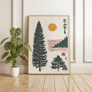 May include: A framed art print featuring a minimalist Japanese-inspired design. The artwork includes illustrations of trees, a sun, and a mountain scene in shades of green, red, and yellow. Japanese characters are also present.