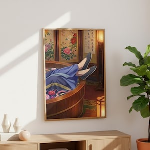 May include: A framed art print depicts a person relaxing in a wooden tub. The person is wearing blue clothing and black shoes. The background features floral artwork and traditional Asian decor. The print is displayed on a wooden cabinet.
