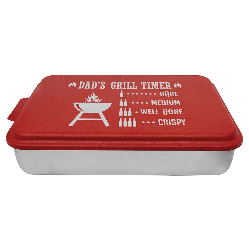 May include: Red metal baking pan with a white lid. The lid has a graphic of a grill with flames and the text "Dad's Grill Timer" with a list of doneness levels: Rare, Medium, Well Done, Crispy.