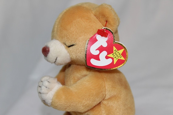 praying beanie baby