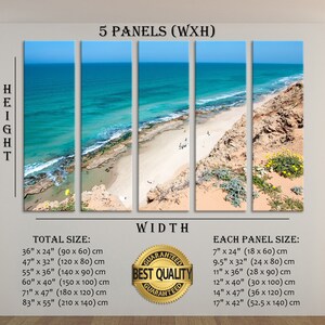 May include: Five-panel canvas art print depicting a coastal scene. The artwork showcases a turquoise ocean meeting a sandy beach, with a clear blue sky above. The total size options range from 36" x 24" to 83" x 55".