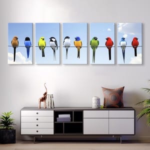 May include: Five-panel canvas print featuring a row of colorful birds perched on a wire against a light blue sky. The birds are predominantly yellow, blue, red, and black, with variations in shades. The artwork is a nature-themed wall decor suitable for homes and offices.