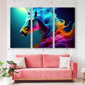 May include: A three-piece abstract canvas art print featuring a colourful horse with flowing mane and tail. The horse is depicted in shades of blue, purple, yellow, and orange.