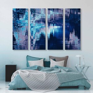 May include: A three-piece abstract art print set featuring a blue and purple color scheme. The prints are framed and hung on a light blue wall above a teal blue bed with white and teal blue bedding.