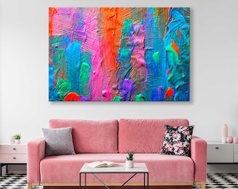 May include: Abstract painting with vibrant colors, including blue, green, pink, orange, and purple. The paint is applied in thick strokes, creating a textured effect.