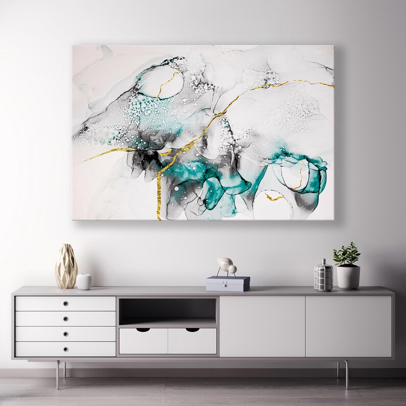 May include: Abstract art print featuring teal, black and gold accents. The print depicts swirling, organic shapes and lines.