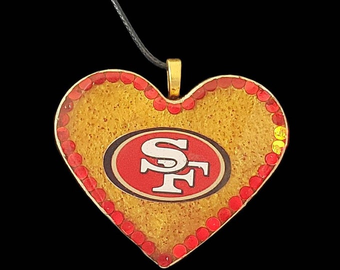 San Francisco 49er heart necklace.