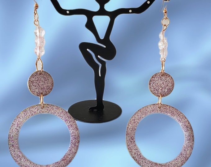 Holographic dangle earrings.