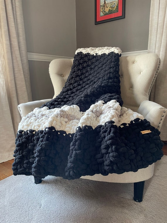Black chunky knitted throw sale