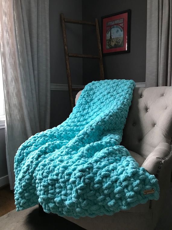 aqua and gray throw blanket