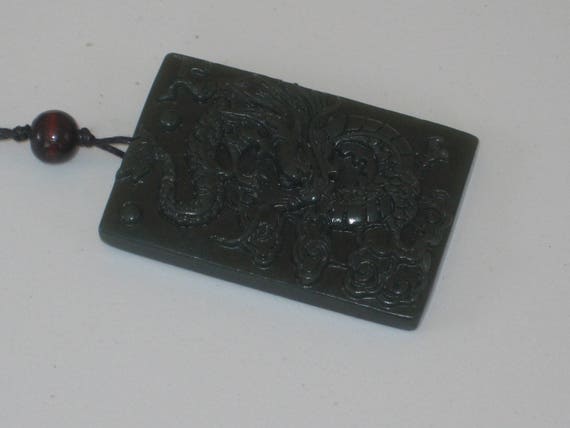 All natural hand carved very old Jade dragon pendant, with adjustable necklace.