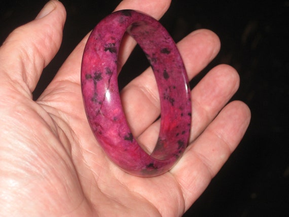 Hand carved peach blossom jade bangle, centre is 63mm.
