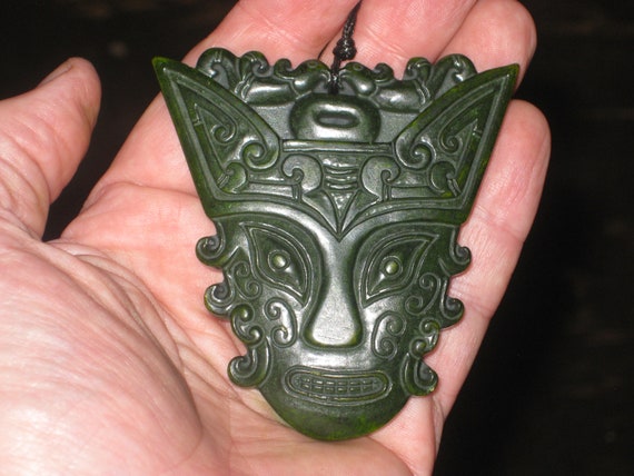 All natural hand carved grade A Jade royal warrior mask pendant, with adjustable necklace.
