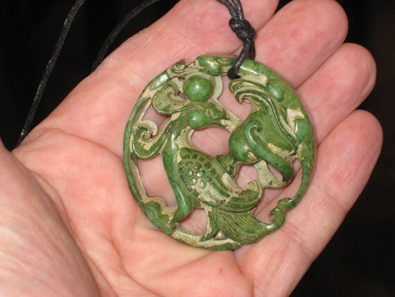 Hand carved Jade phoenix and beast pendant, with adjustable necklace.