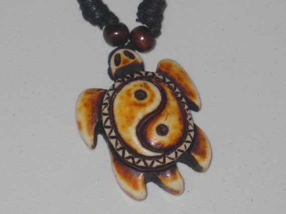 Surfers Ying Yang turtle necklace, adjustable up to 32" long.