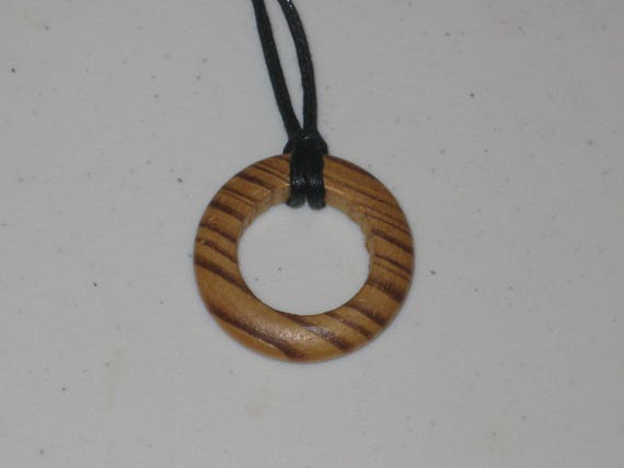 Hand carved wood circle.