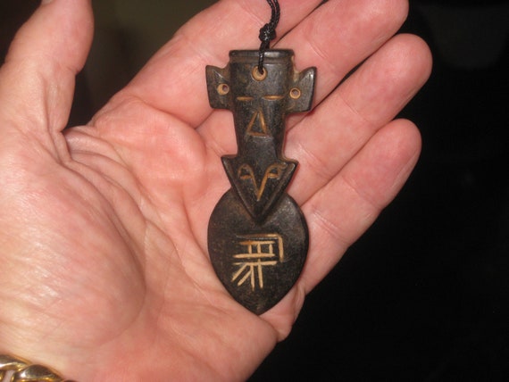 All natural hand carved two sided very old black Jade stone arrow head pendant.