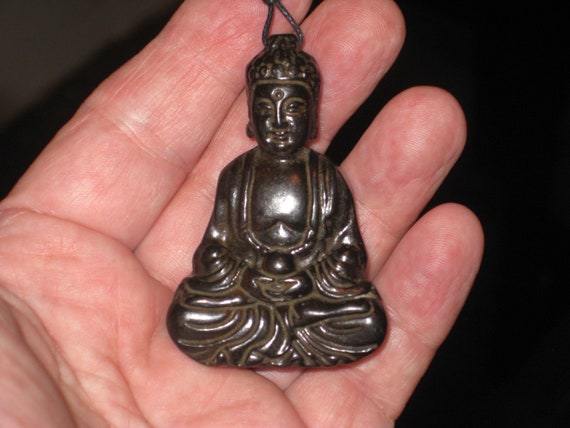 All natural hand carved Jade Buddha pendant, with adjustable necklace.
