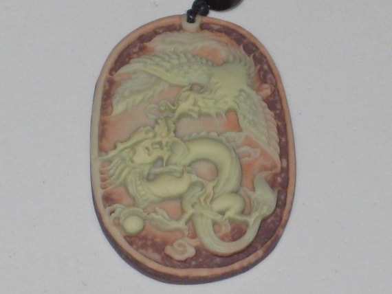 All natural hand carved Jade stone dragon pendant, with adjustable necklace.