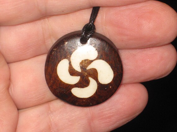 Buffalo bone African tribal, hand carved pendant.