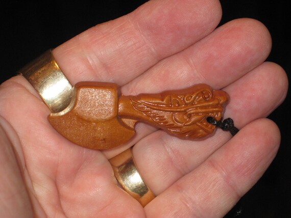 Hand carved Rosewood dragon axe pendant necklace.